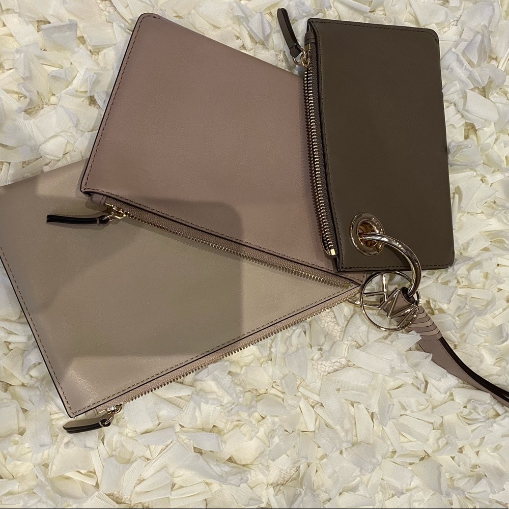 Michael kors trio clutch  pouches